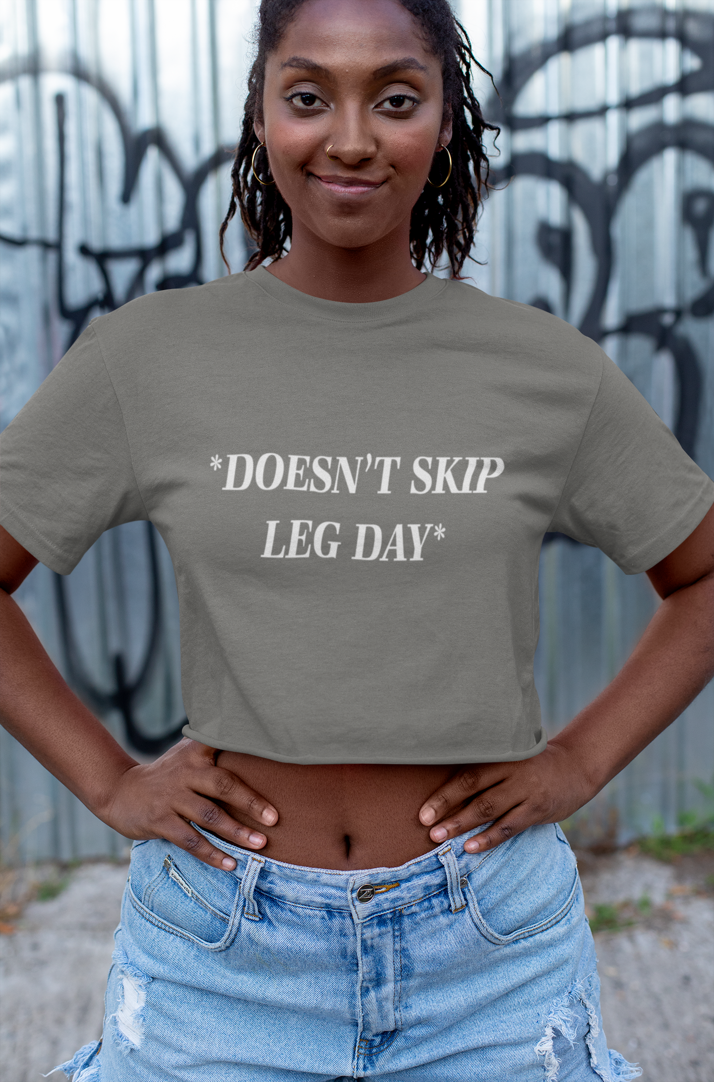 DOESN'T SKIP LEG DAY Crop Top